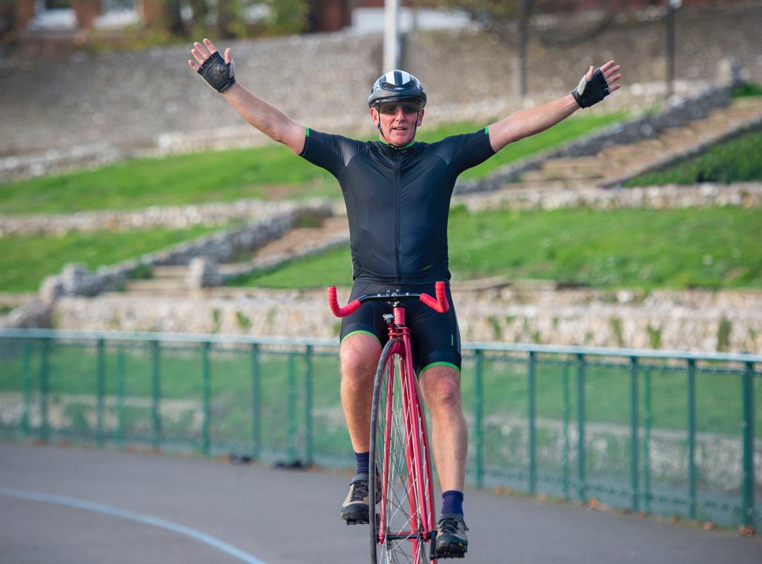 Neil Laughton riding unicycle