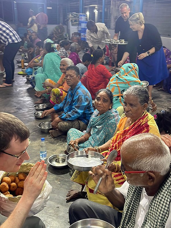 Team helping to serve food