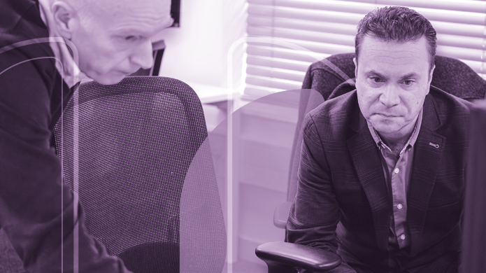 Two Initium colleagues-working in the office Two Initium colleagues-working in the office